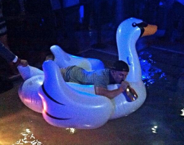 Johnny_Manziel_Riding_Inflatable_Swan_Champagne_Bottle_Picture_Video